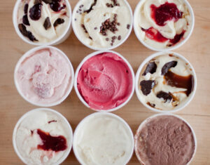 Aerial view of an assortment of nine ice cream flavors